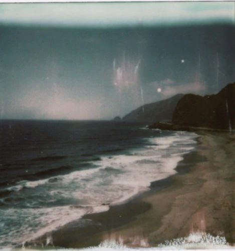 A quiet coastline with waves breaking on the shore